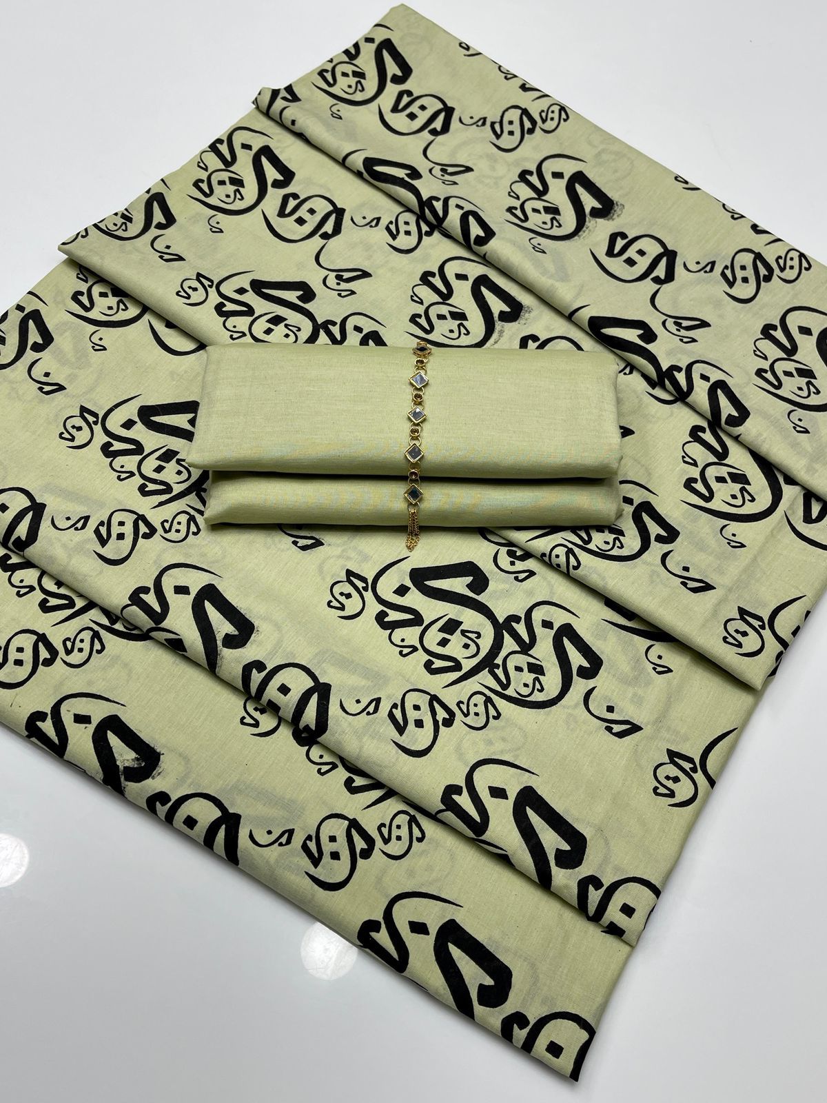 Khaddi Lawn,Shirt & Trouser, printed calligraphy dupatta.