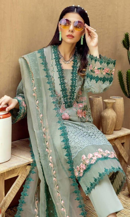 Premium dress featuring a front lawn print, complemented by an embroidered patch on the daman.