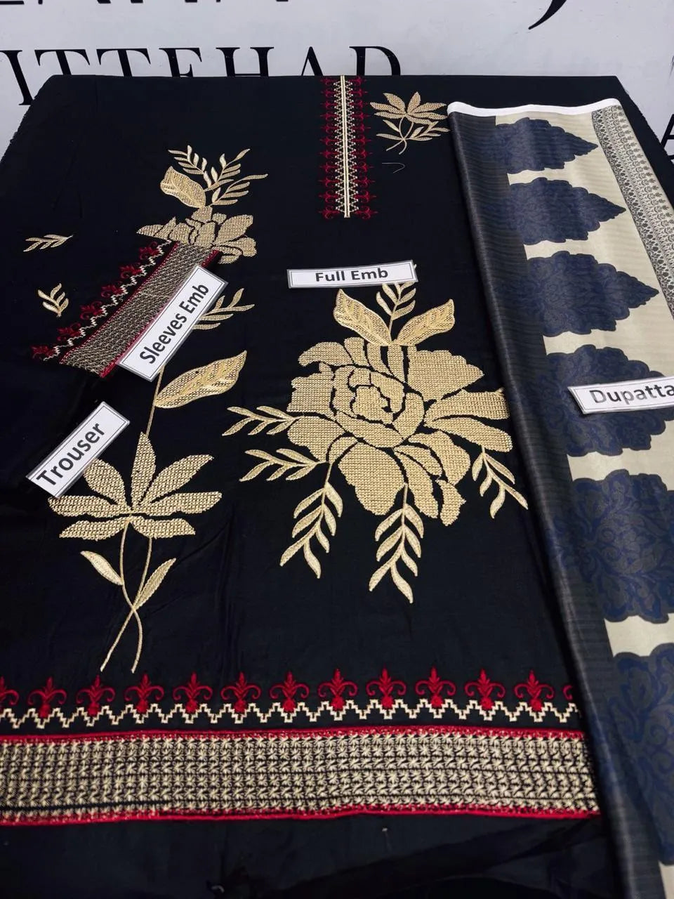 Women's embroidered unstitched dress winter collection