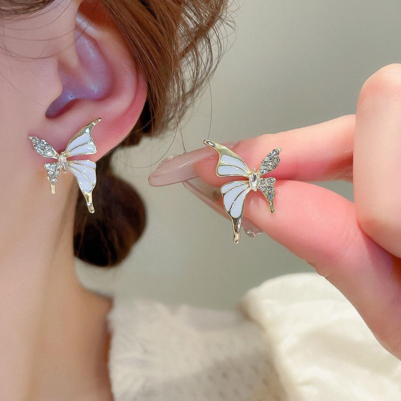 Butterfly earring gold plated with stone