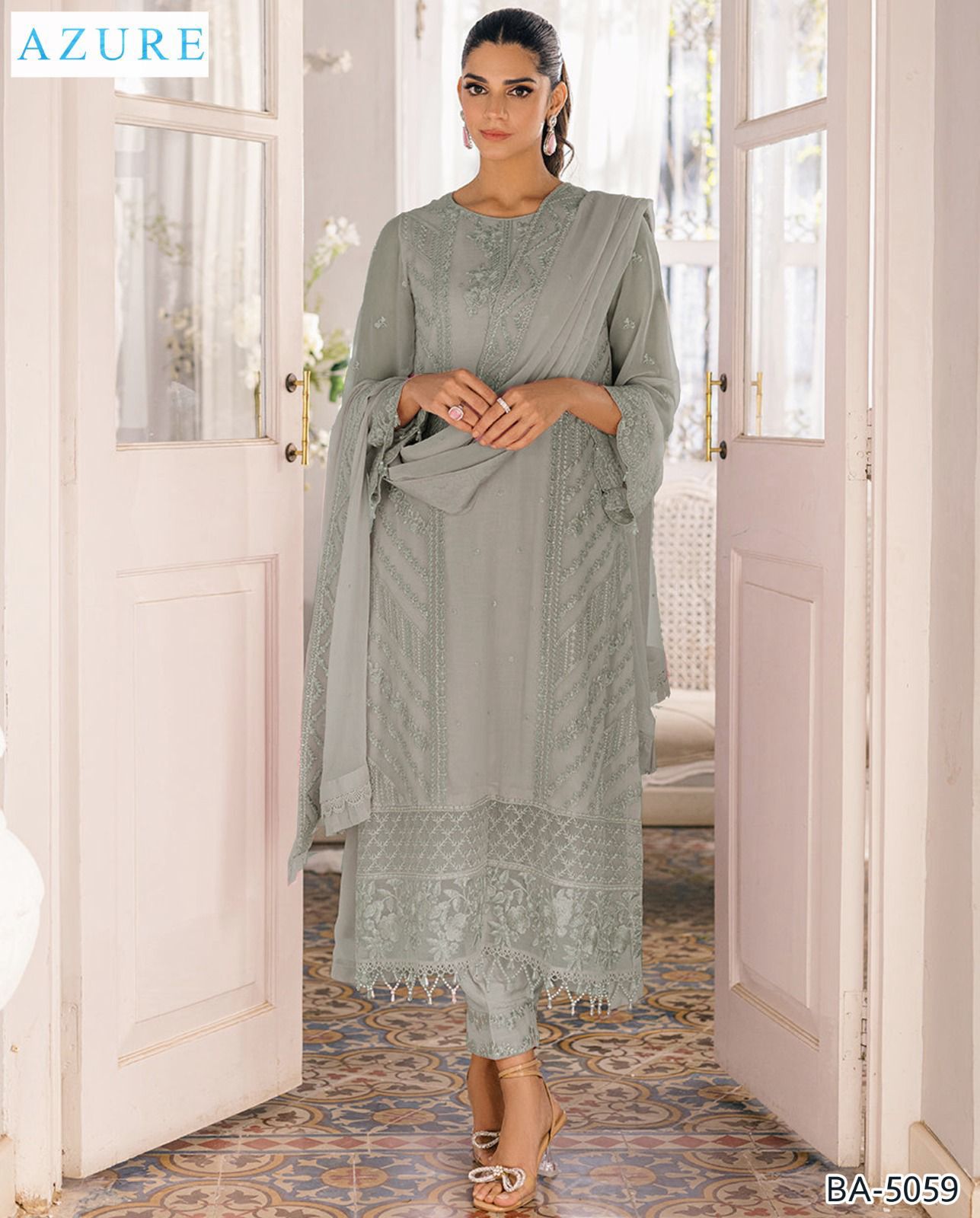 BANADORA LAWN 100-100*
3pc embroidered**Neck,Daman patch embroidered*