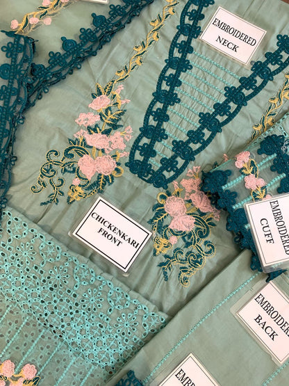 Premium dress featuring a front lawn print, complemented by an embroidered patch on the daman.