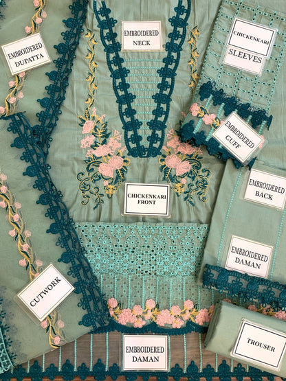 Premium dress featuring a front lawn print, complemented by an embroidered patch on the daman.